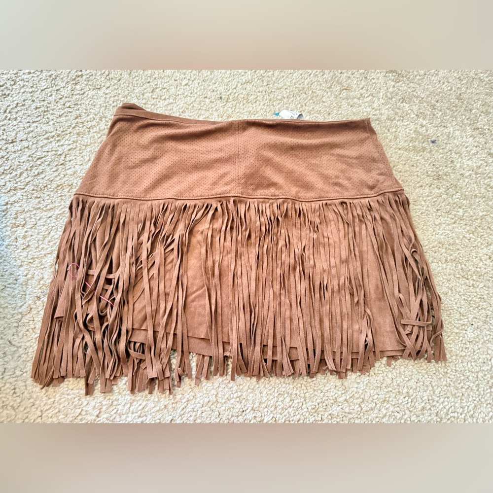 American Rag. Gently used size 15 fringe skirt. Waist 14 Length 22